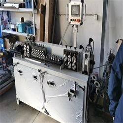 Straightening and cutting machine for stainless steel wedge wires